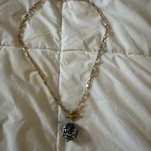 Elegant Gold Necklace with Blue Pendant